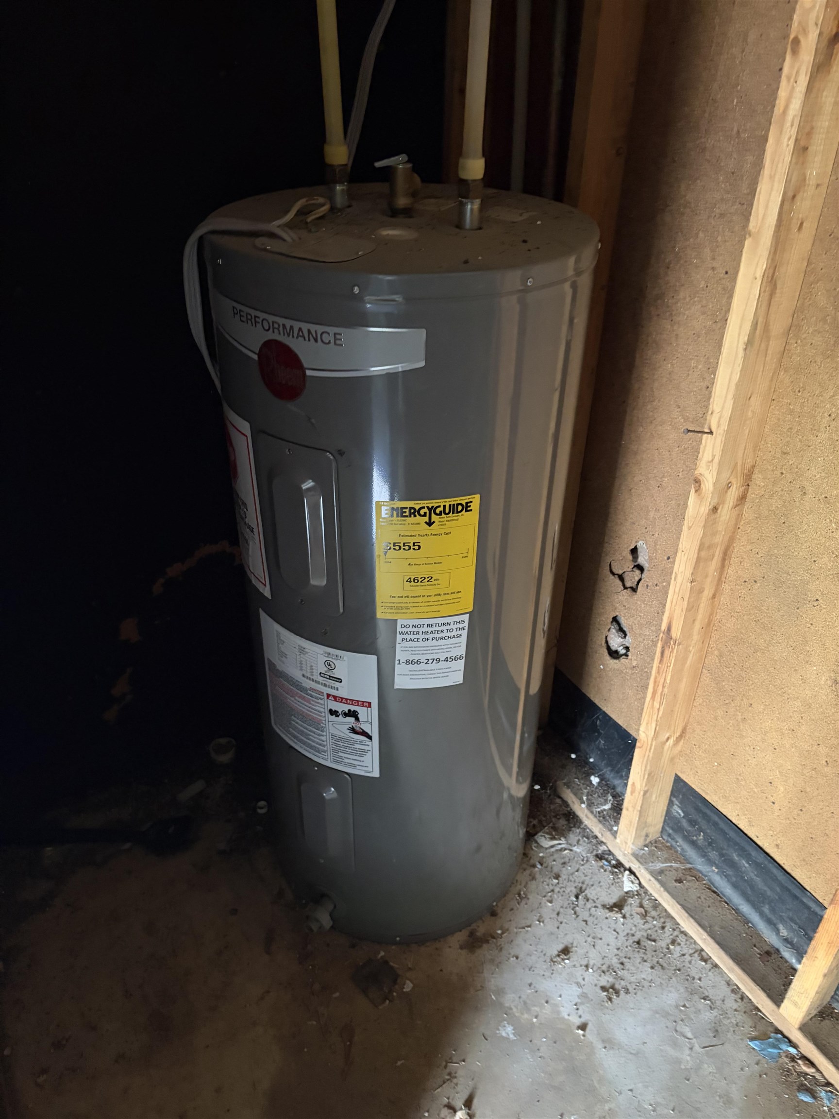 4993 Cedar View Road Memphis, TN 38118 - Photo 2 of 23 Water heater with visible piping and energy guide label, situated on a concrete floor