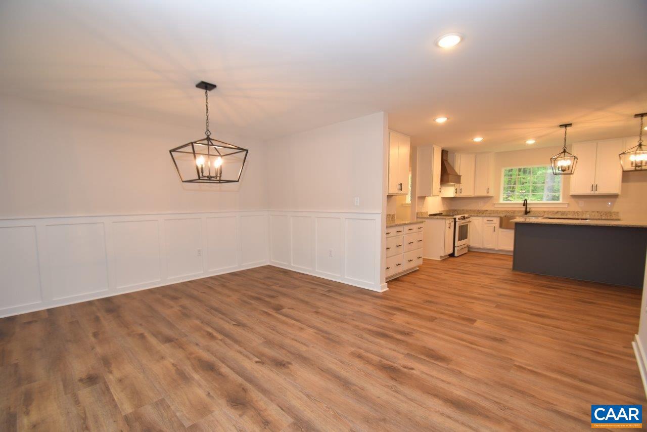 1045 Chopping Road, Unit CP 1 Mineral, VA 23117 - Photo 15 of 27 a view of a kitchen with a sink a refrigerator and wooden floor
