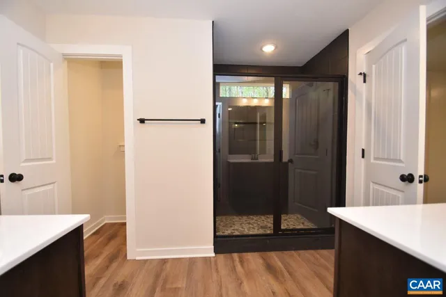 a bathroom with a sink and mirror