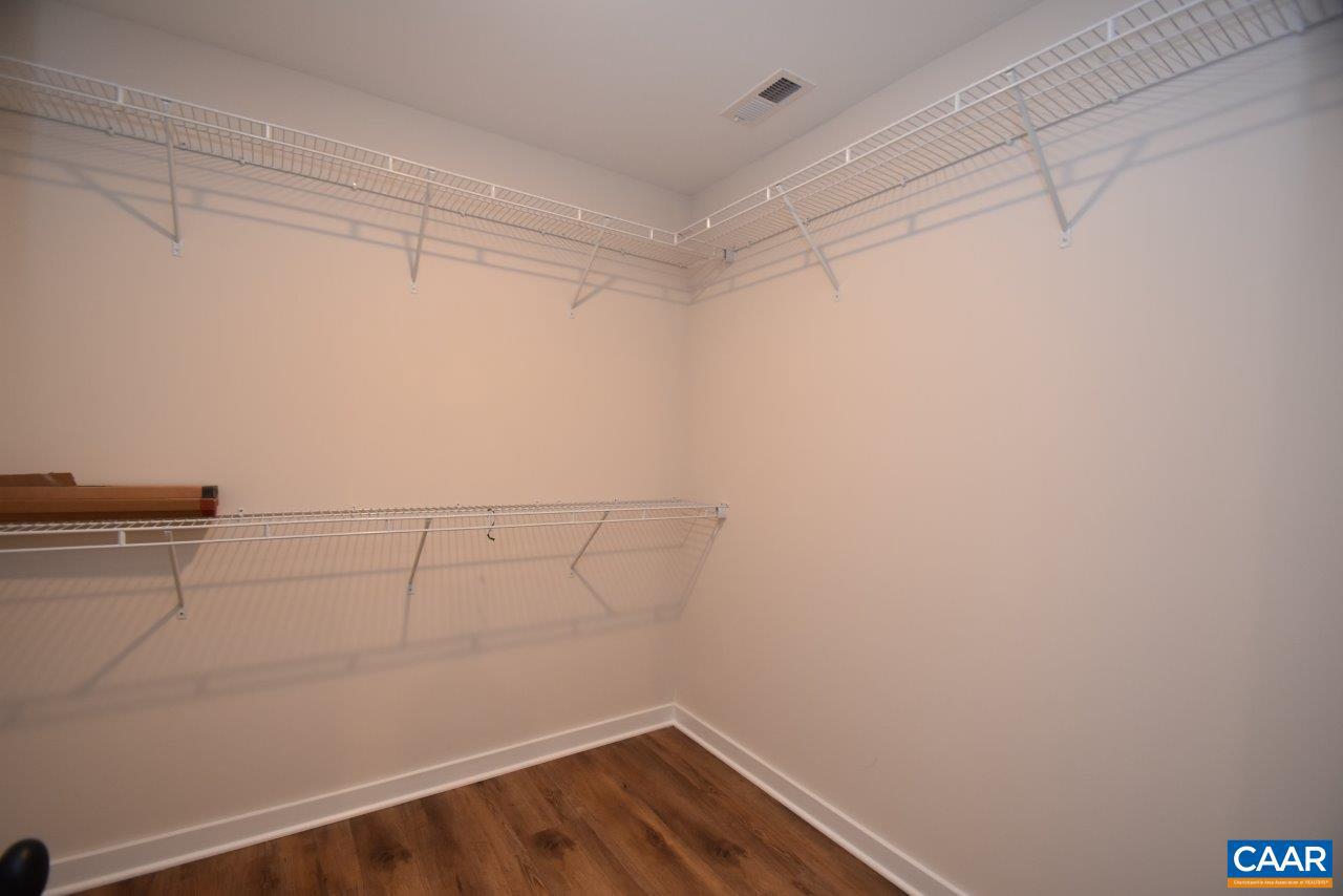 1045 Chopping Road, Unit CP 1 Mineral, VA 23117 - Photo 21 of 27 a view of a room with racks on the wall