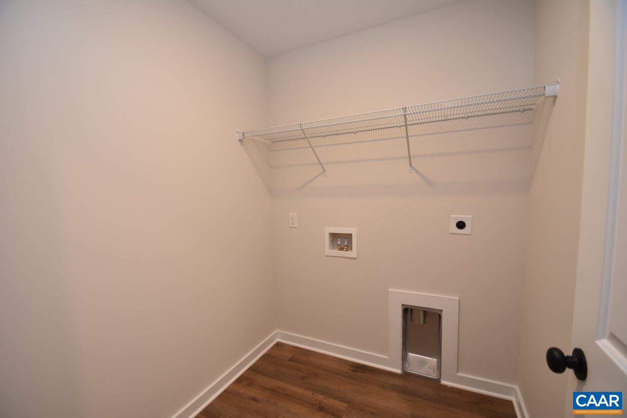 1045 Chopping Road, Unit CP 1 Mineral, VA 23117 - Photo 22 of 27 a view of a room with wooden floor and cabinet