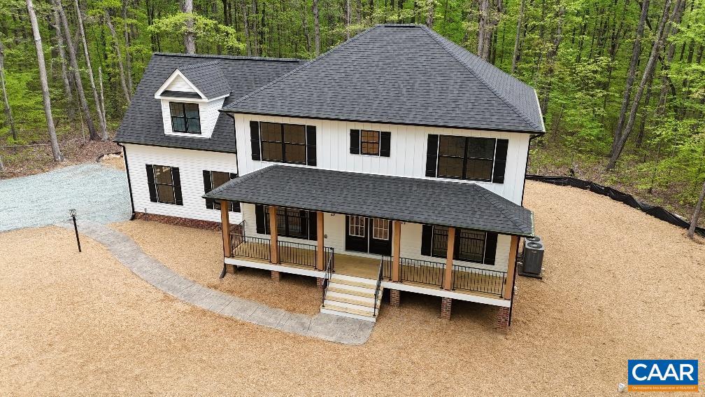 1045 Chopping Road, Unit CP 1 Mineral, VA 23117 - Photo 3 of 27 a front view of a house with a yard