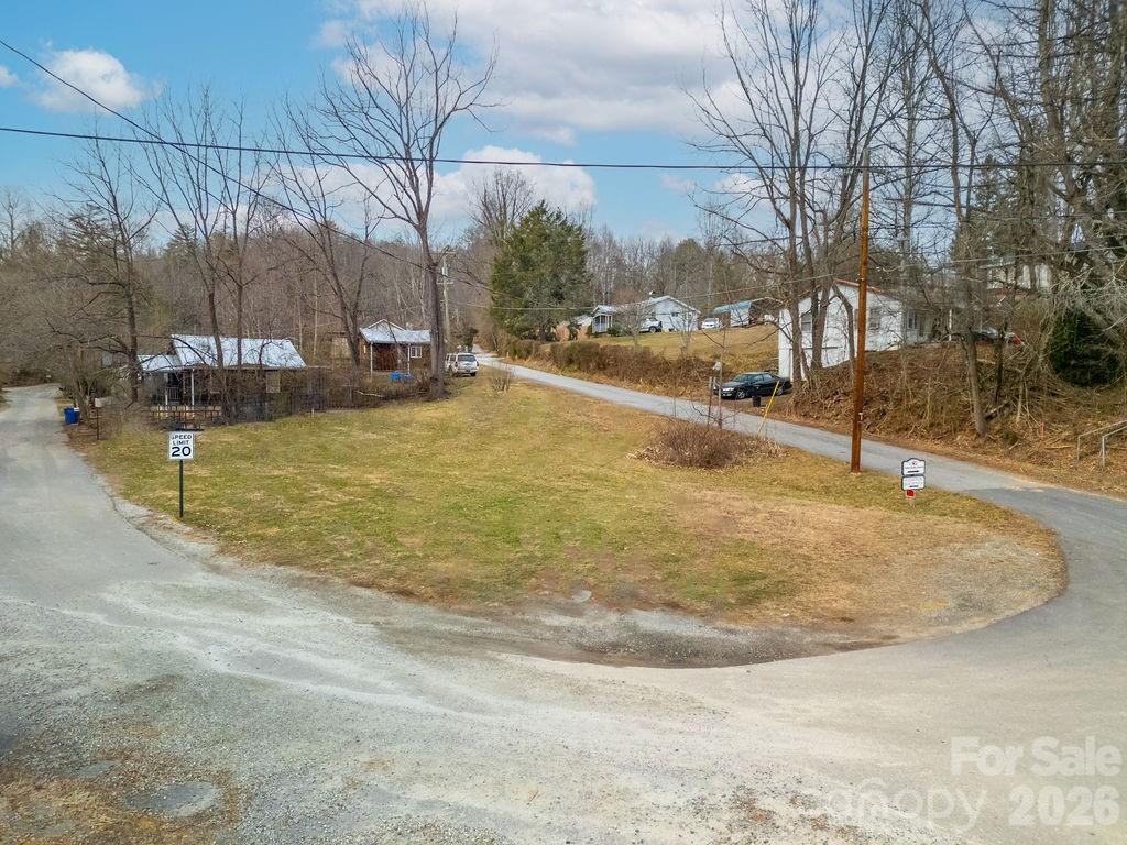 10 Hampton Road, Unit 1 Brevard, NC 28712 - Photo 2 of 9 a view of a swimming pool with an outdoor space
