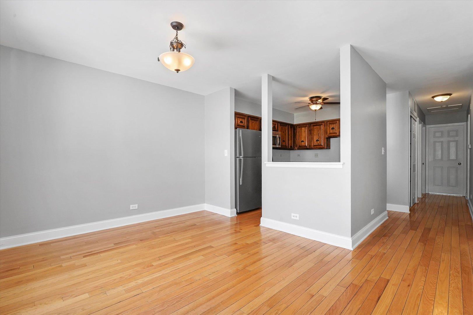210 Mill Stream Drive Bolingbrook, IL 60440 - Photo 12 of 39 a view of empty room with wooden floor
