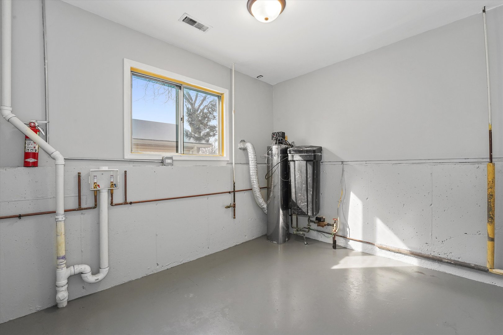 210 Mill Stream Drive Bolingbrook, IL 60440 - Photo 39 of 39 a view of a storage & utility room with refrigerator and window