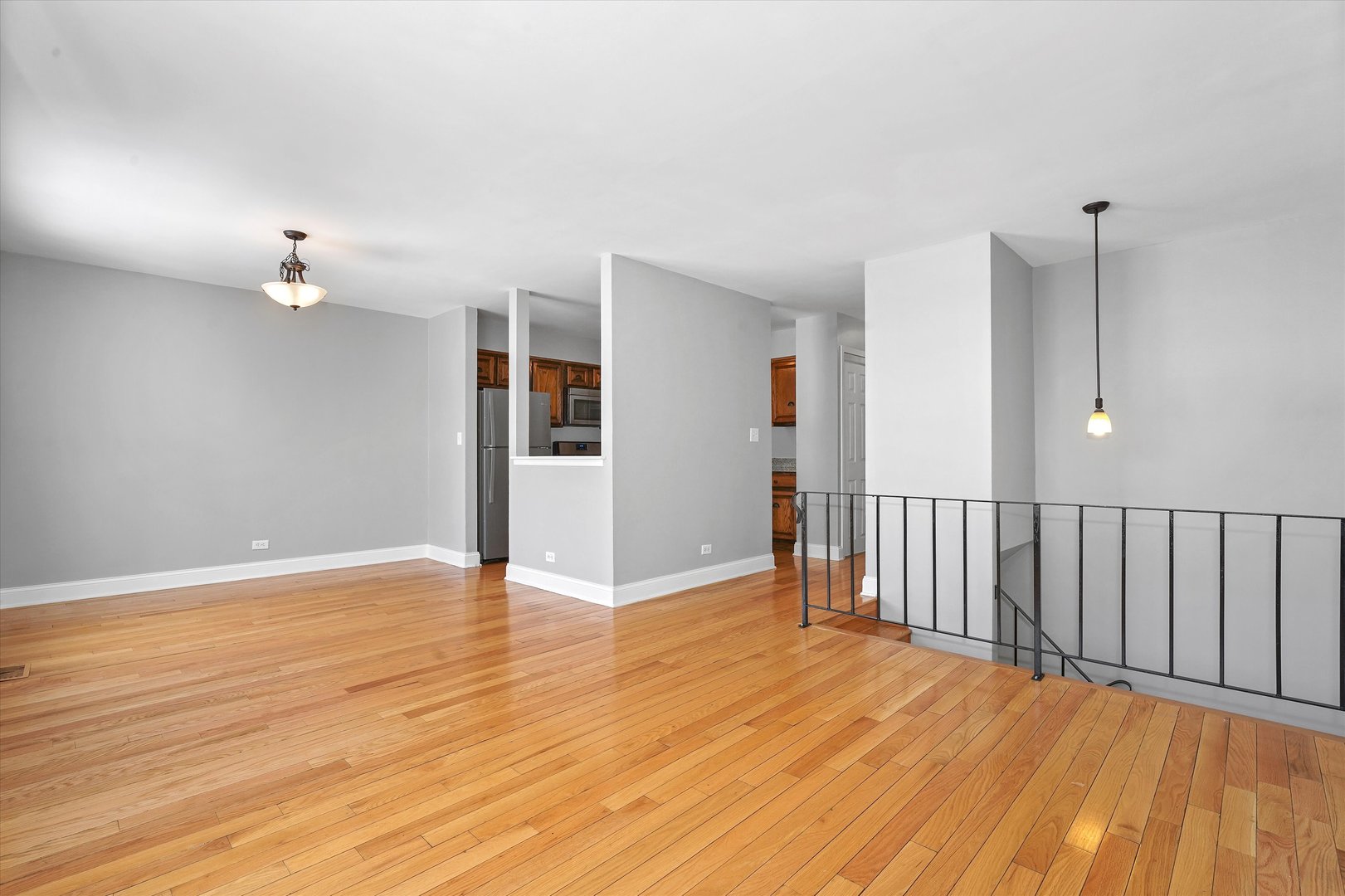 210 Mill Stream Drive Bolingbrook, IL 60440 - Photo 8 of 39 a view of an empty room with wooden floor