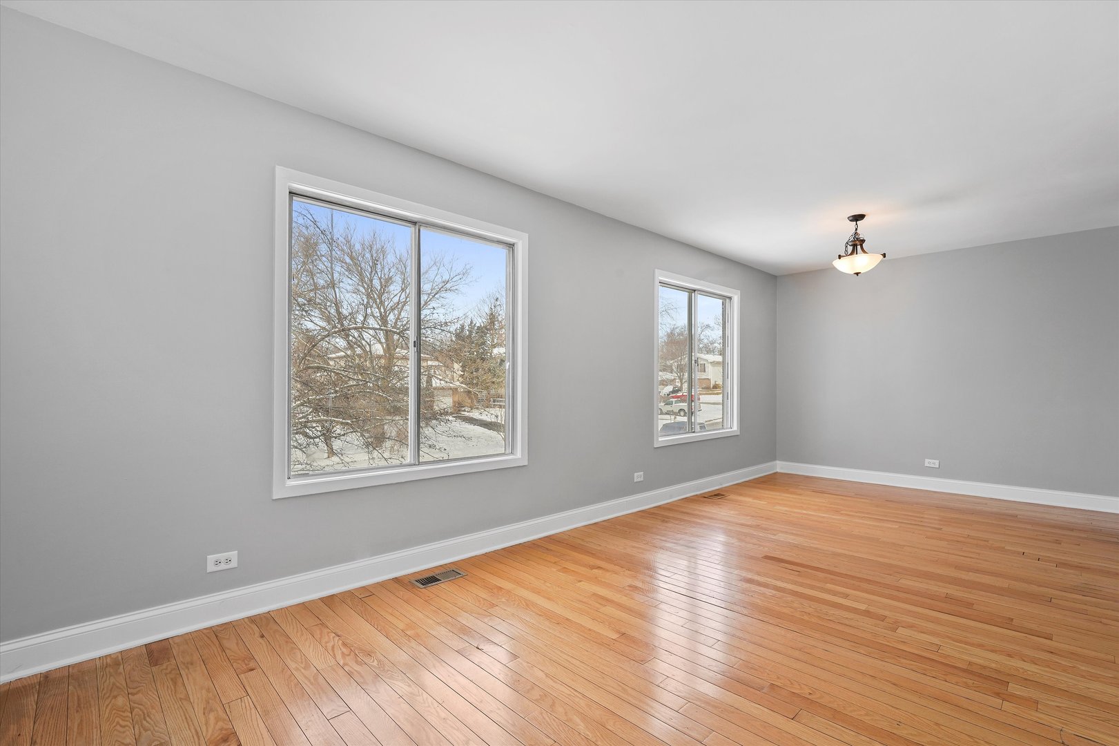 210 Mill Stream Drive Bolingbrook, IL 60440 - Photo 10 of 39 a view of an empty room with wooden floor and a window