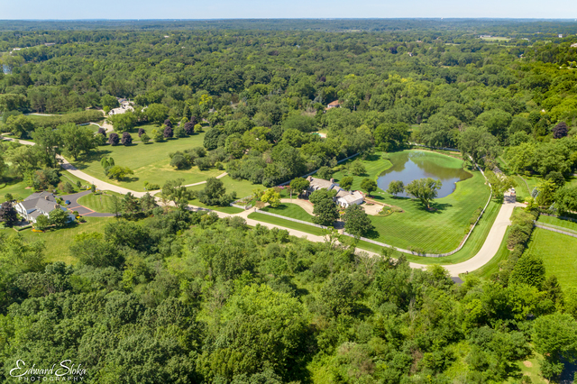 Lot 0 Steeplechase Road Chicago, IL 60639 - Photo 10 of 12 an aerial view of residential houses with outdoor space and trees