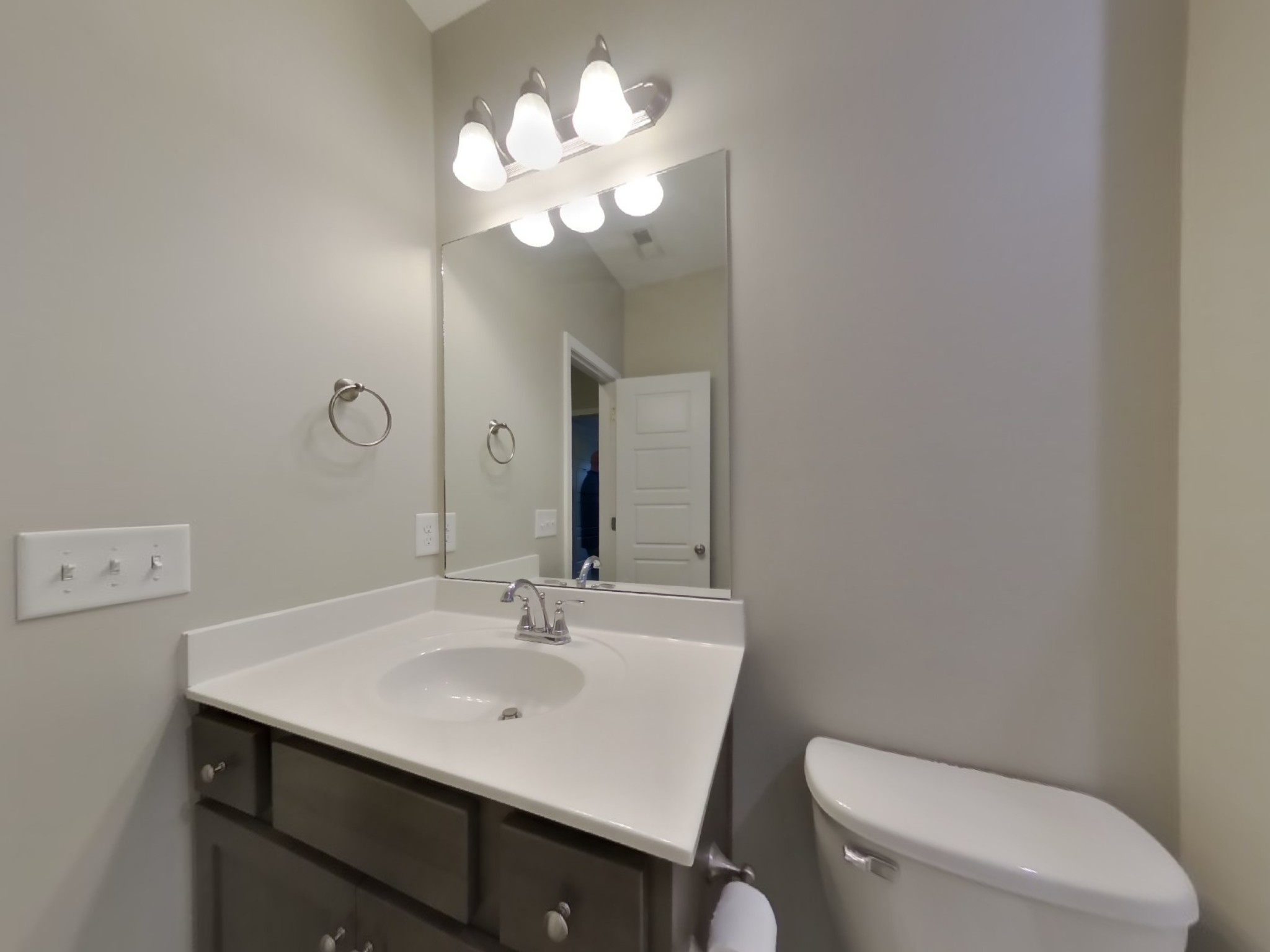 825 Ellyson Drive Spring Hill, TN 37174 - Photo 15 of 17 a bathroom with a toilet sink and mirror