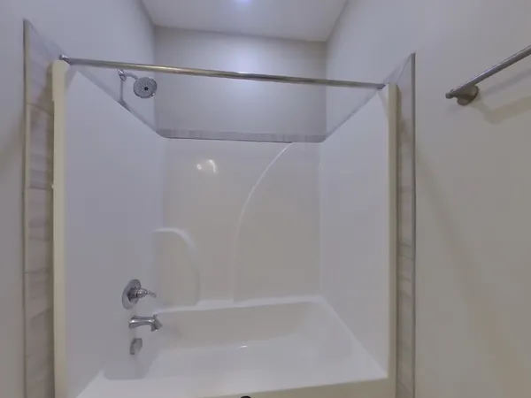 a brick house with yard