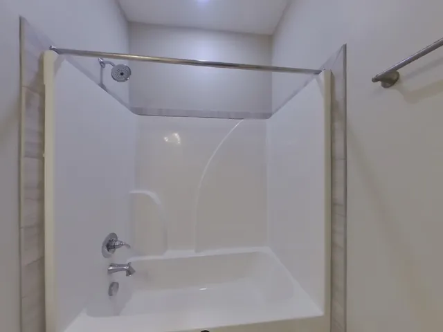 a brick house with yard