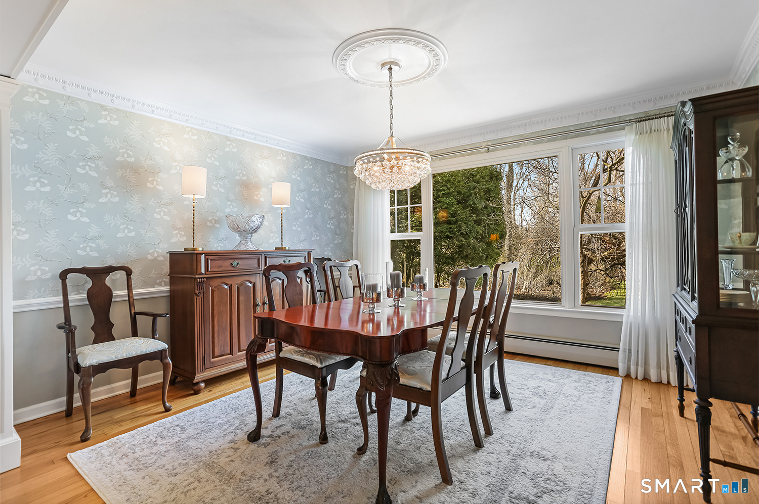 757 Galloping Hill Road Fairfield, CT 06824 - Photo 15 of 30 a view of a dining room with furniture window and outside view