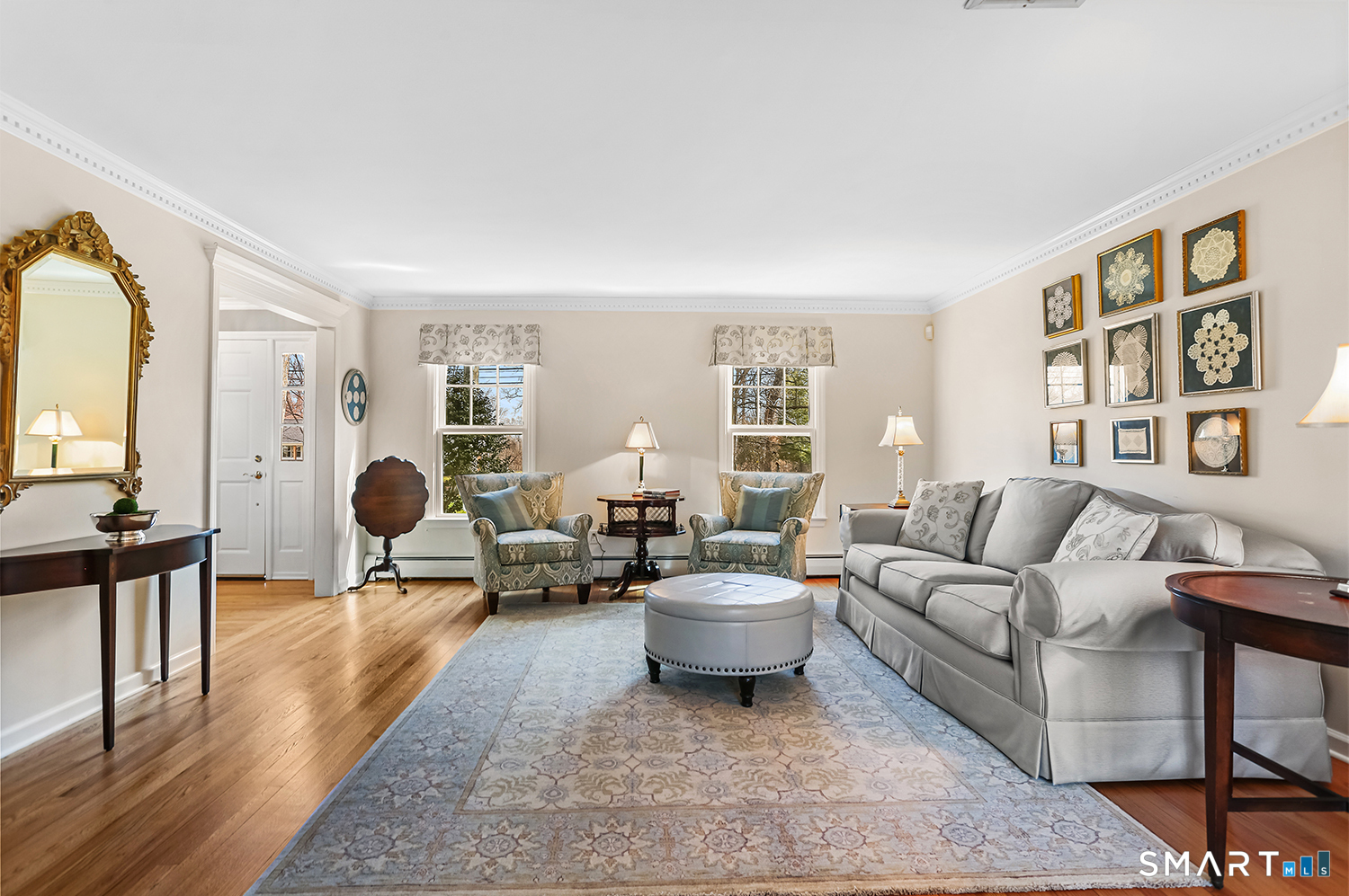 757 Galloping Hill Road Fairfield, CT 06824 - Photo 16 of 30 a living room with furniture and a large window