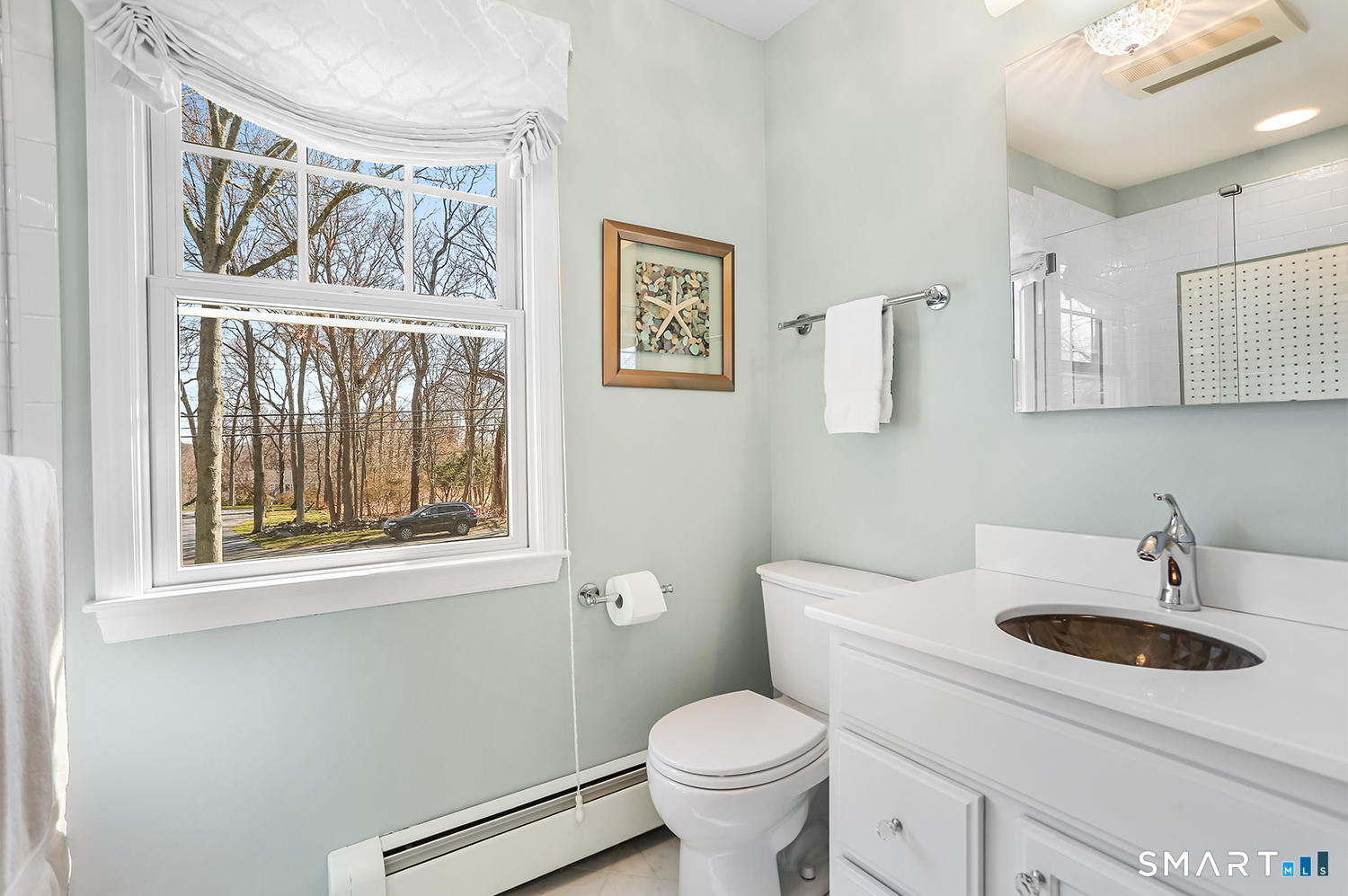 757 Galloping Hill Road Fairfield, CT 06824 - Photo 21 of 30 a bathroom with a sink and a toilet