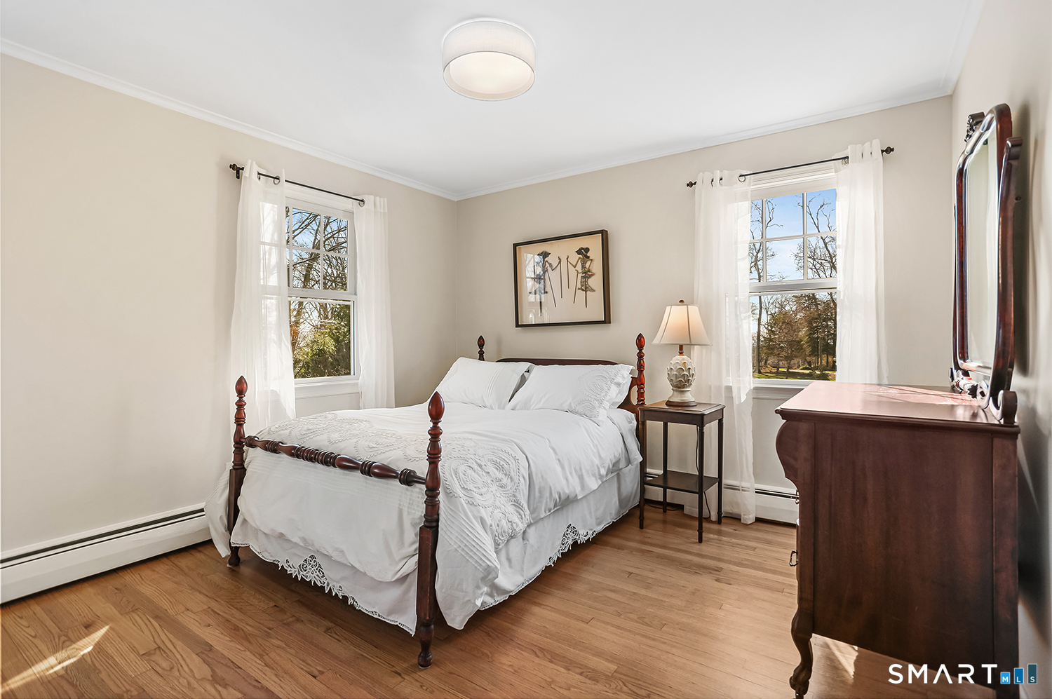 757 Galloping Hill Road Fairfield, CT 06824 - Photo 22 of 30 a bed room with a bed and a window
