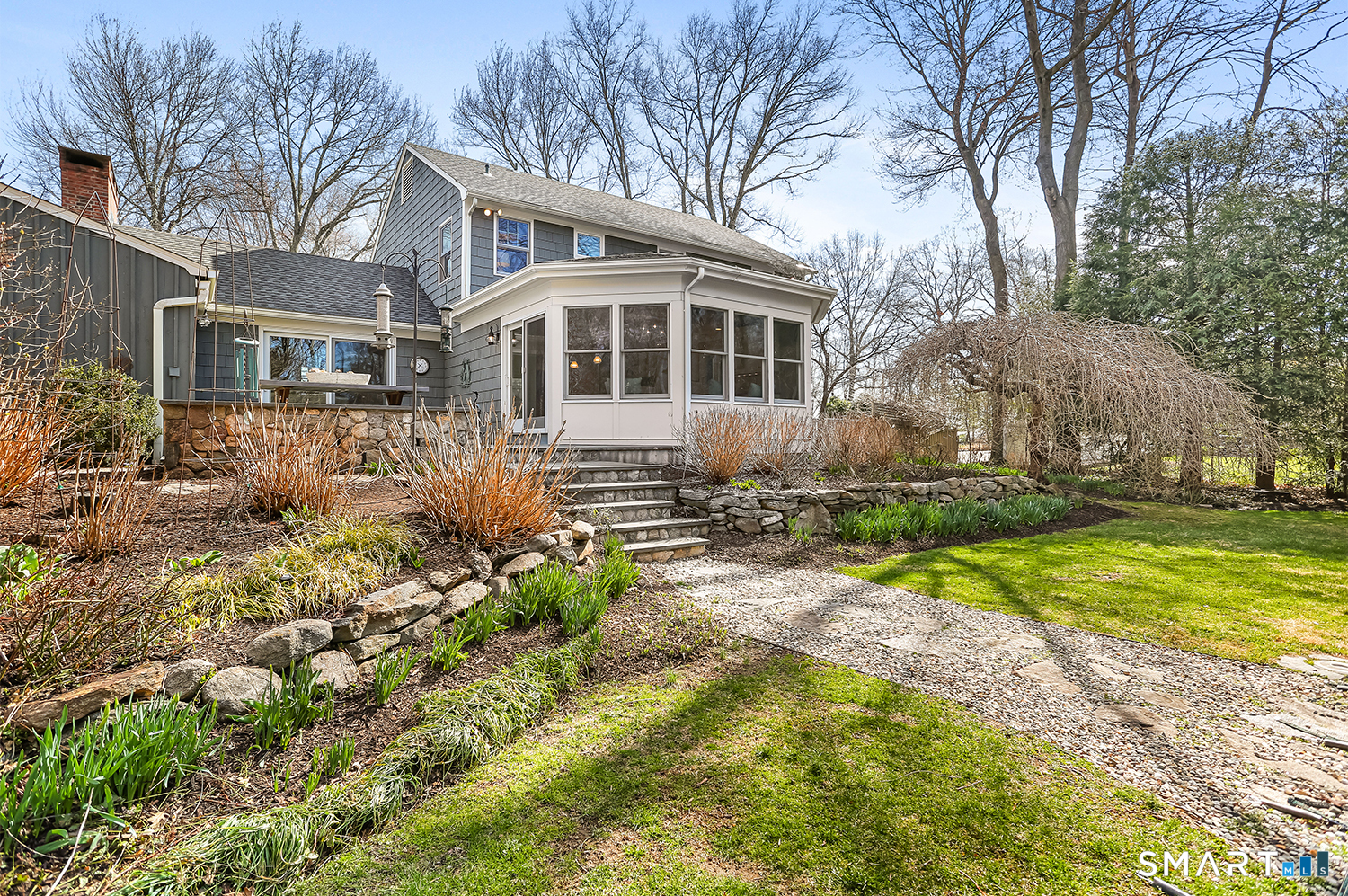 757 Galloping Hill Road Fairfield, CT 06824 - Photo 26 of 30 a front view of a house with garden