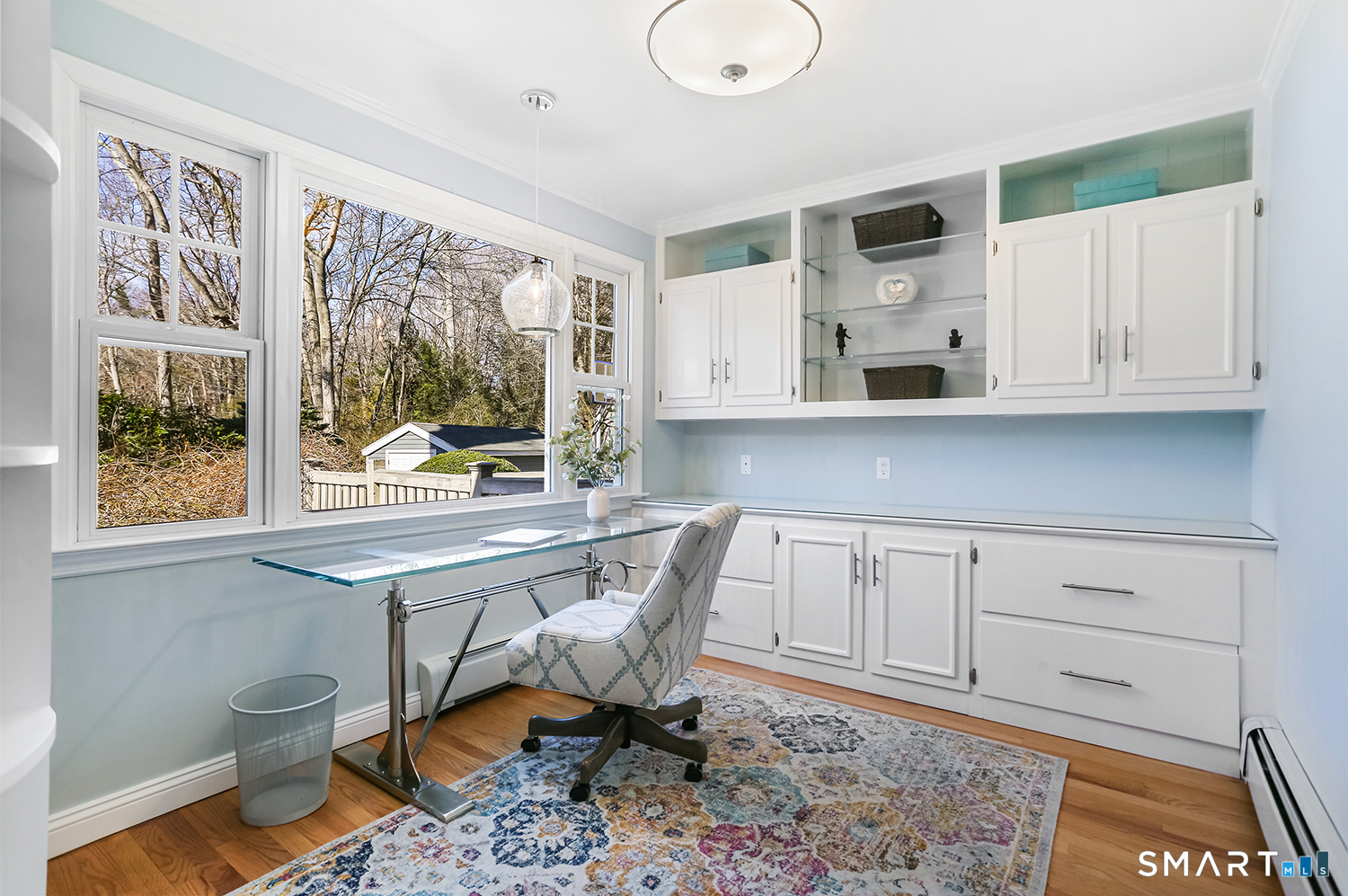 757 Galloping Hill Road Fairfield, CT 06824 - Photo 10 of 30 a workspace with wooden floor and a window