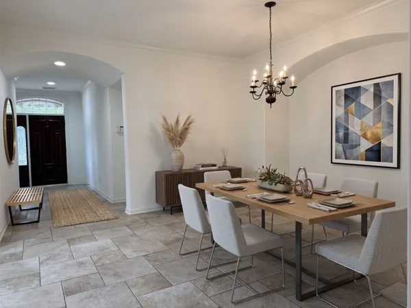 a view of a dining room with furniture