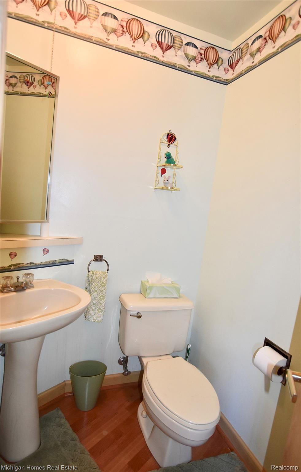 9753 Gibbs Road Clarkston, MI 48348 - Photo 26 of 43 first floor powder room