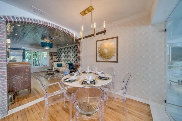 a kitchen with stainless steel appliances granite countertop a refrigerator sink and cabinets