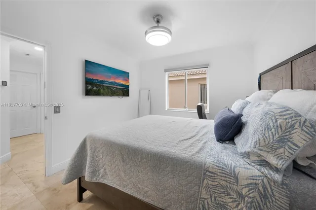 a view of a house with backyard and porch