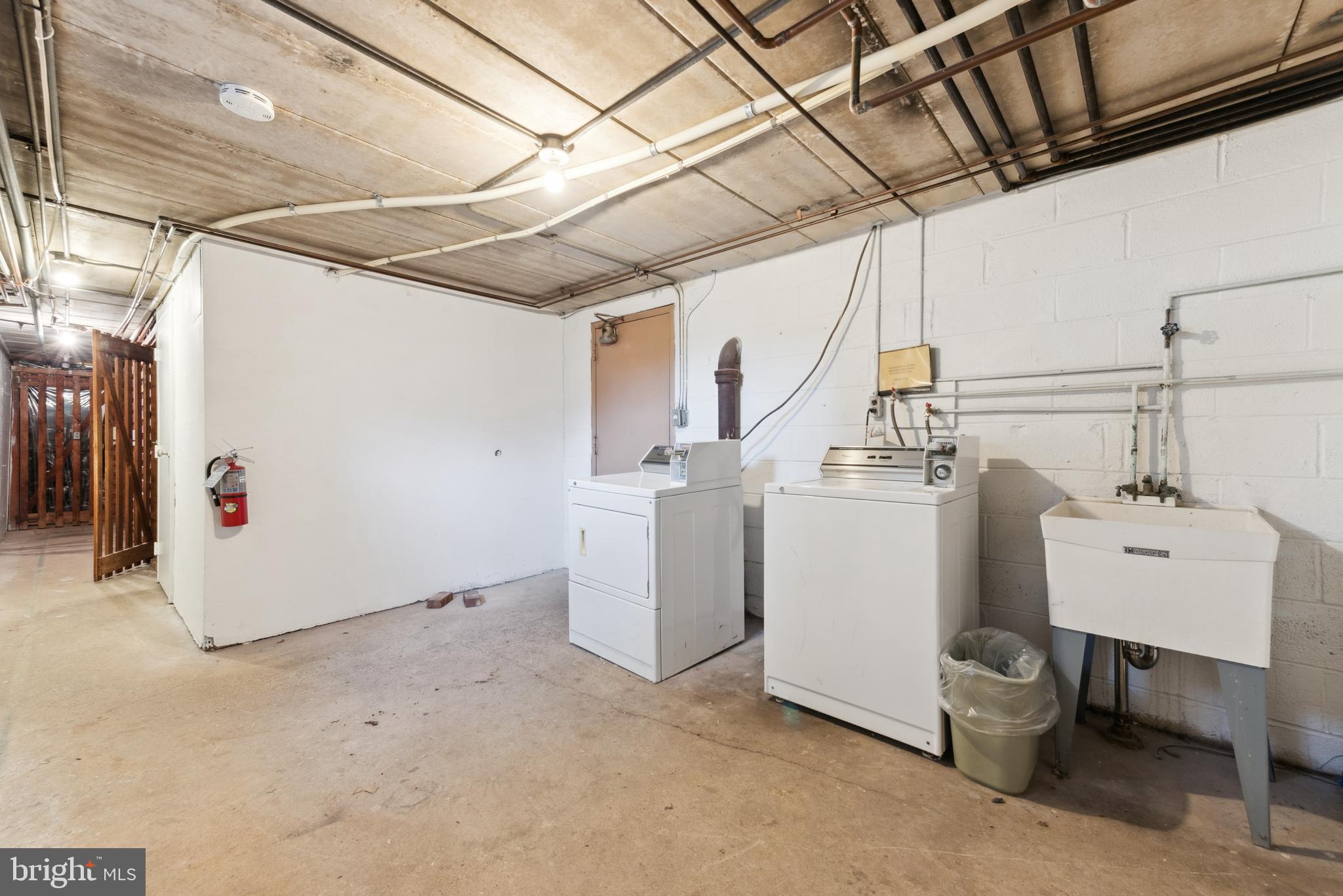 1334 Montgomery Avenue, Unit D3 Narberth, PA 19072 - Photo 12 of 15 a utility room with dryer and washer