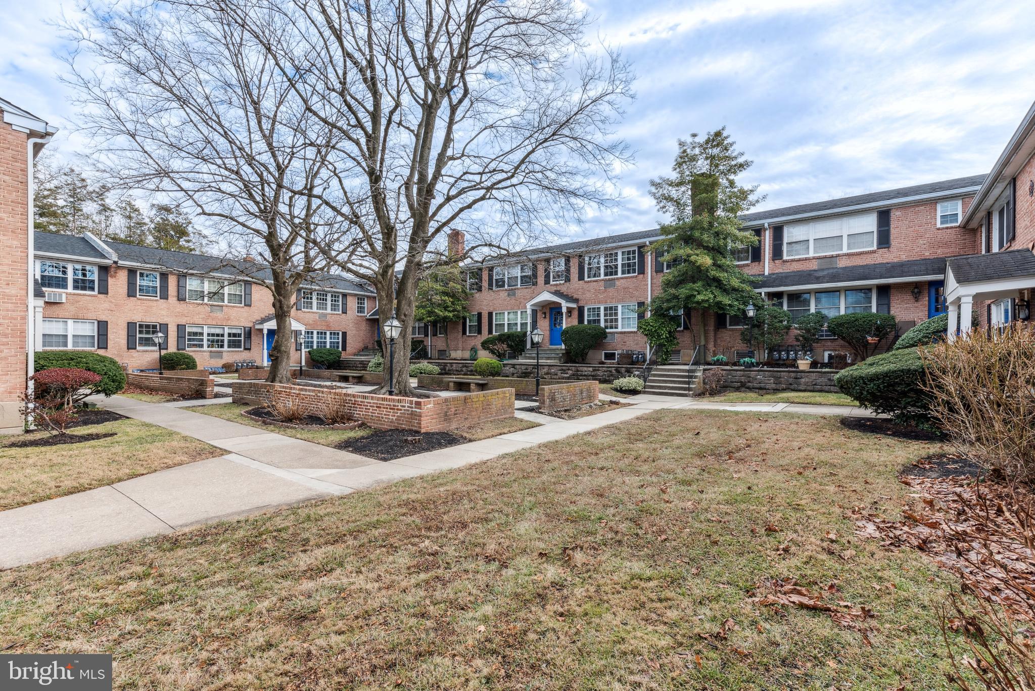 1334 Montgomery Avenue, Unit D3 Narberth, PA 19072 - Photo 2 of 15 a view of a town with buildings and trees