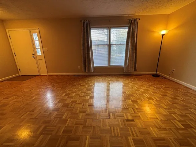 a view of an empty room with window