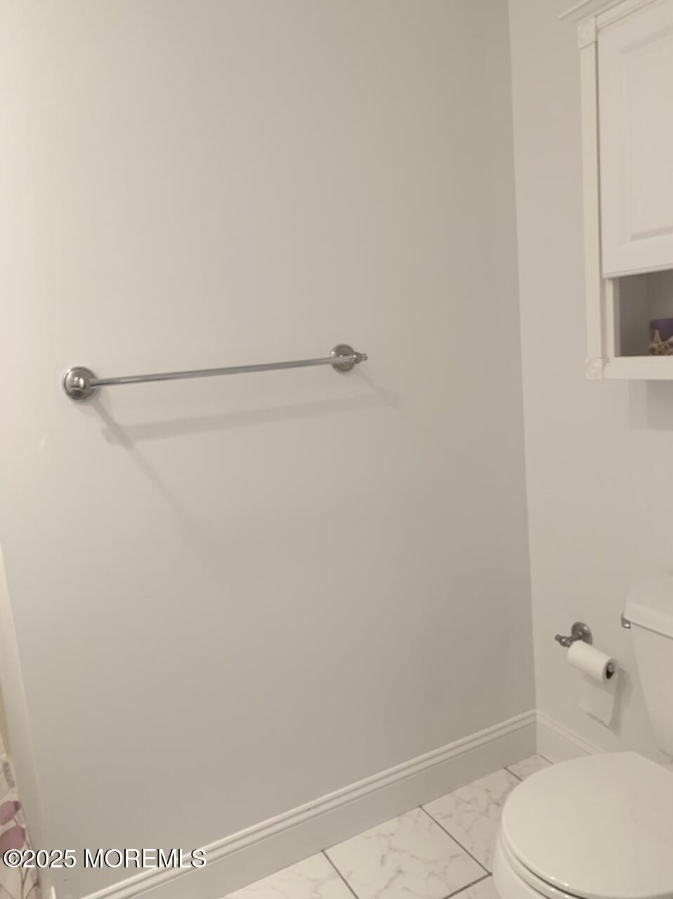 15 9th Avenue, Unit UPPR Seaside Park, NJ 08752 - Photo 19 of 24 a bathroom with a toilet and a shower