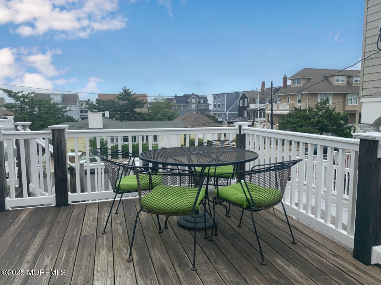 15 9th Avenue, Unit UPPR Seaside Park, NJ 08752 - Photo 21 of 24 a view of a chairs on the roof deck