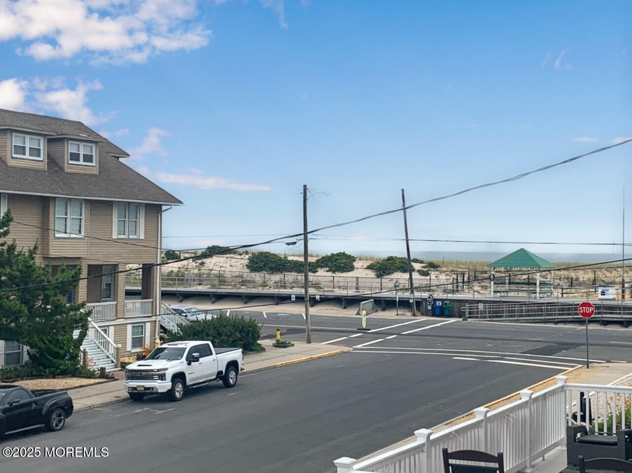 15 9th Avenue, Unit UPPR Seaside Park, NJ 08752 - Photo 24 of 24 a car parked in front of a building