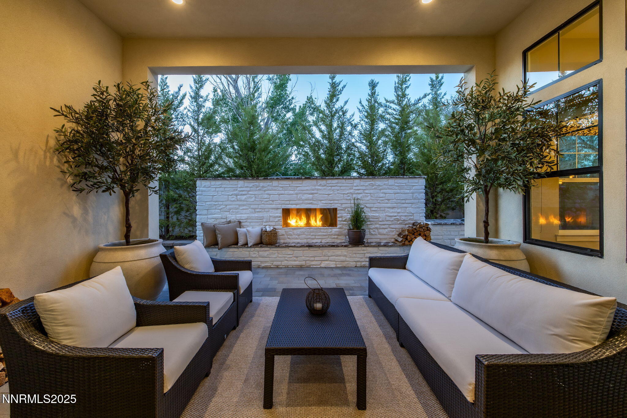 709 West Pleasant Oak Trail Reno, NV 89511 - Photo 1 of 44 a outdoor living space with furniture and a fireplace