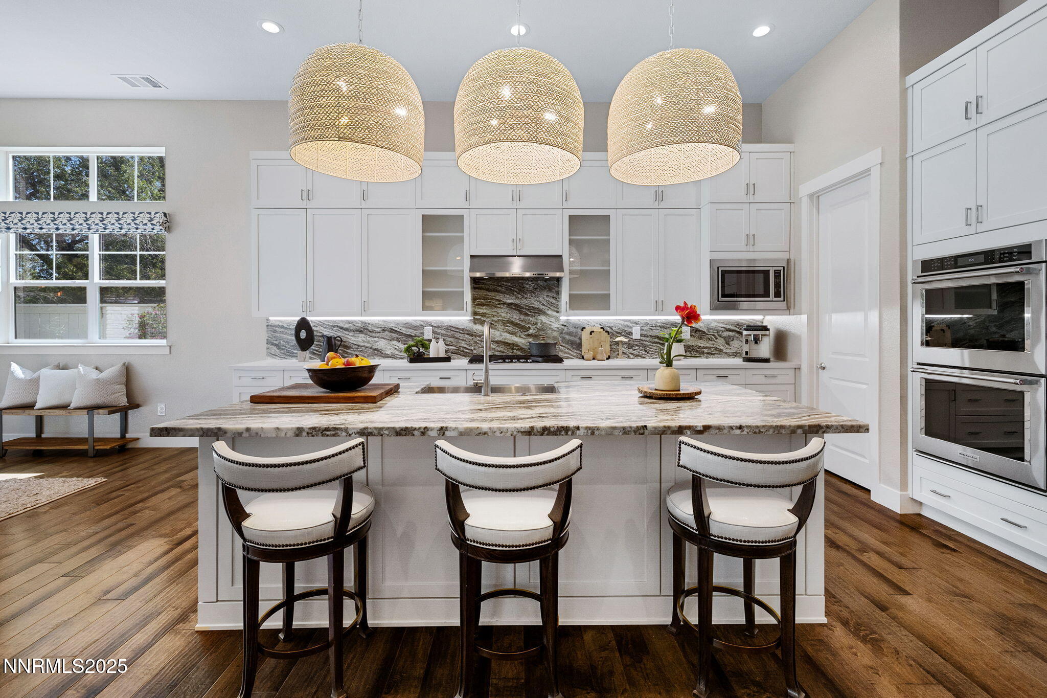 709 West Pleasant Oak Trail Reno, NV 89511 - Photo 13 of 44 a kitchen with stainless steel appliances a dining table and chairs