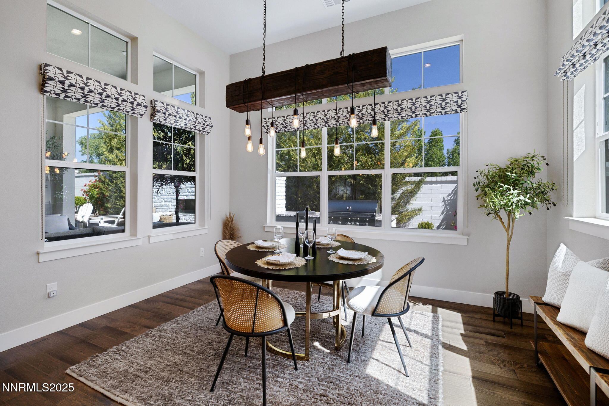 709 West Pleasant Oak Trail Reno, NV 89511 - Photo 17 of 44 a kitchen with a table and chairs in it