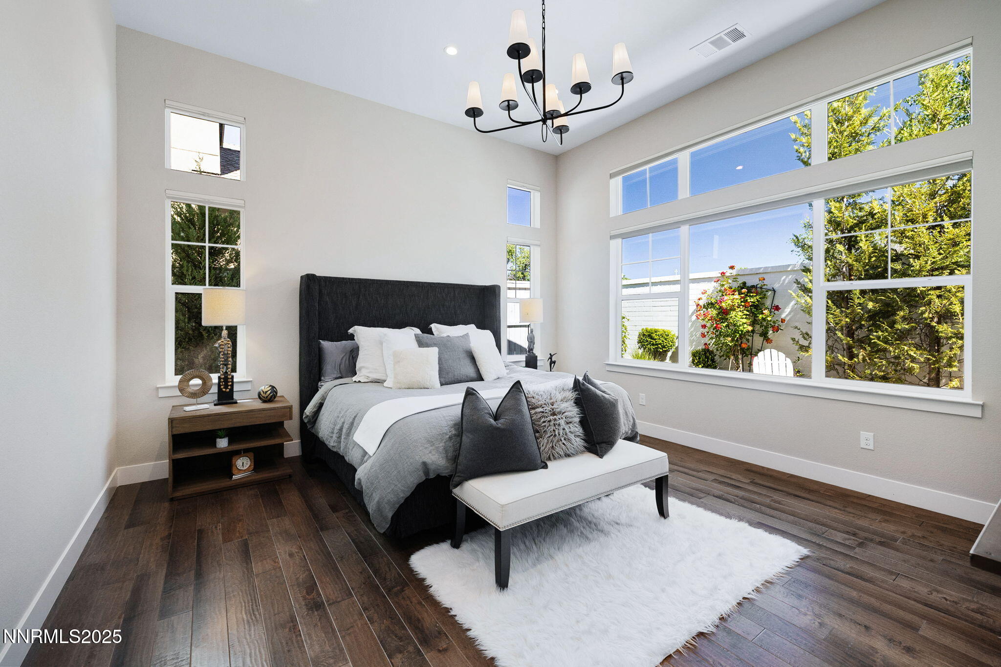 709 West Pleasant Oak Trail Reno, NV 89511 - Photo 20 of 44 a spacious bedroom with a bed and a window