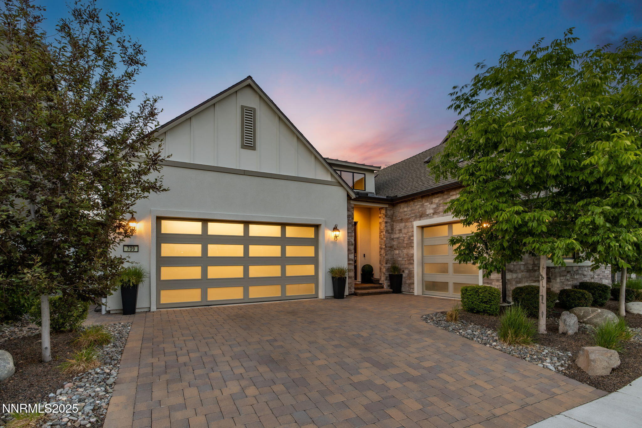 709 West Pleasant Oak Trail Reno, NV 89511 - Photo 2 of 44 a front view of a house with a yard