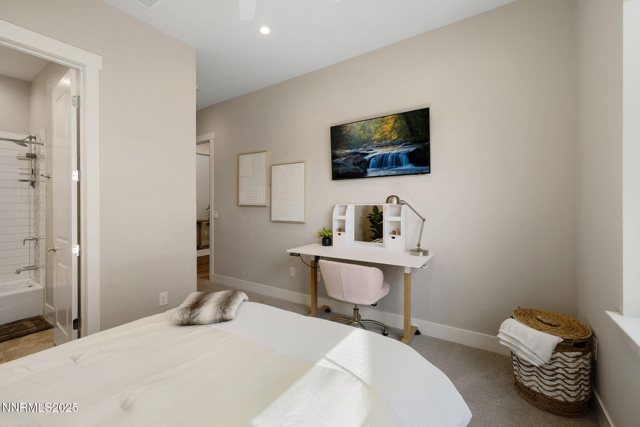 709 West Pleasant Oak Trail Reno, NV 89511 - Photo 26 of 44 a room with a couch and a flat screen tv