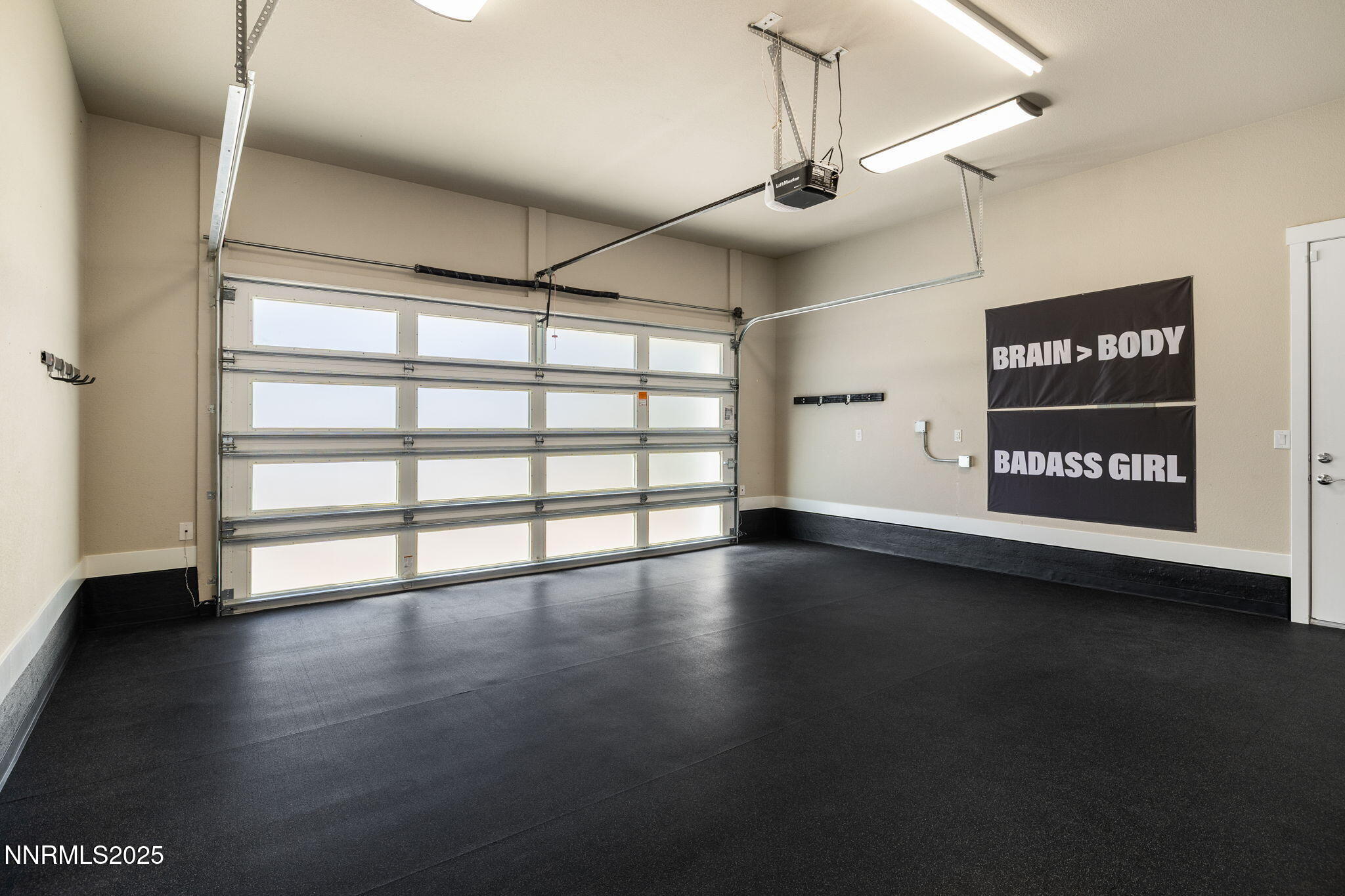 709 West Pleasant Oak Trail Reno, NV 89511 - Photo 35 of 44 a view of a room with wooden floors and windows