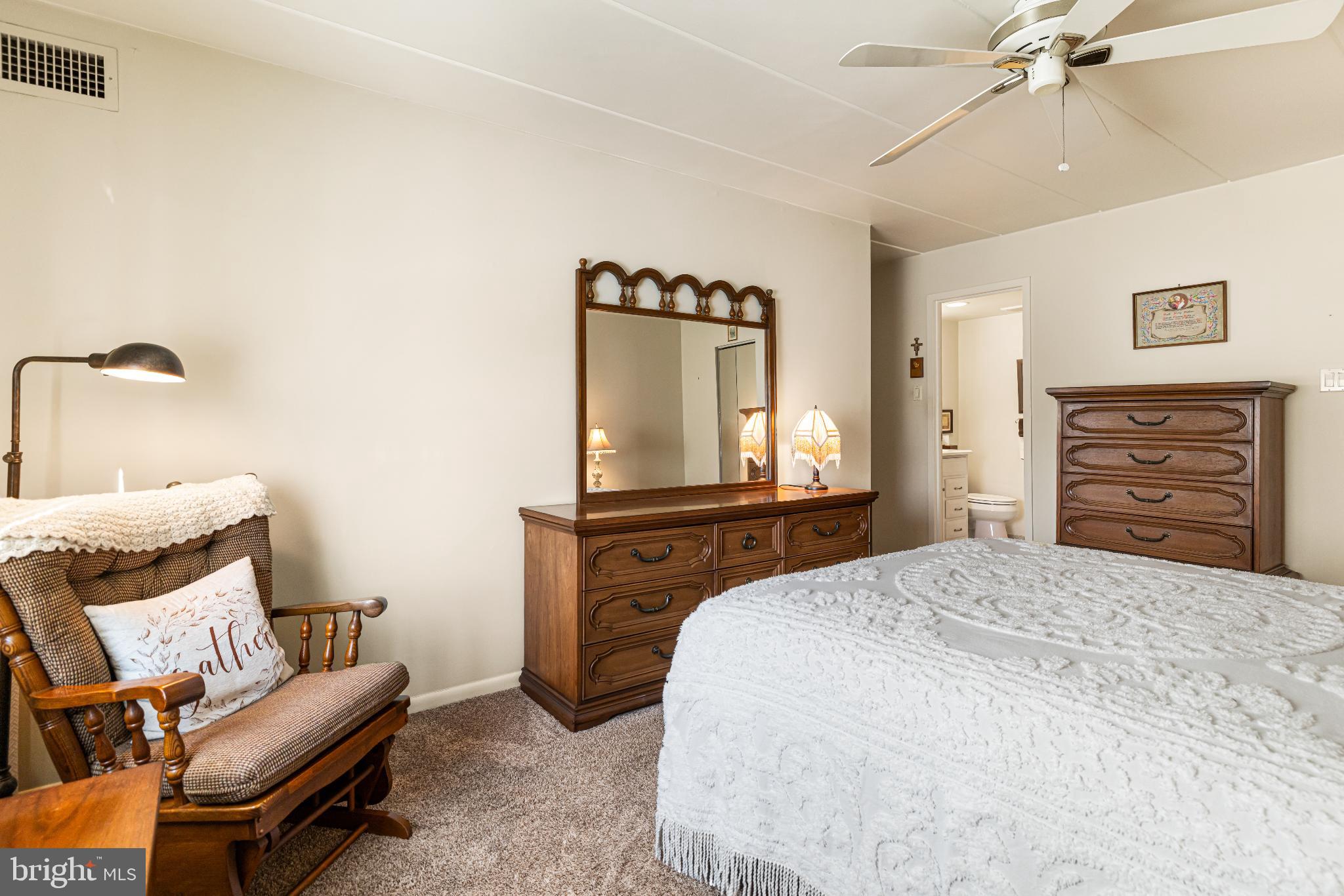 64003 Delaire Landing Road, Unit 3 Philadelphia, PA 19114 - Photo 11 of 16 Cozy bedroom with classic wooden accents.