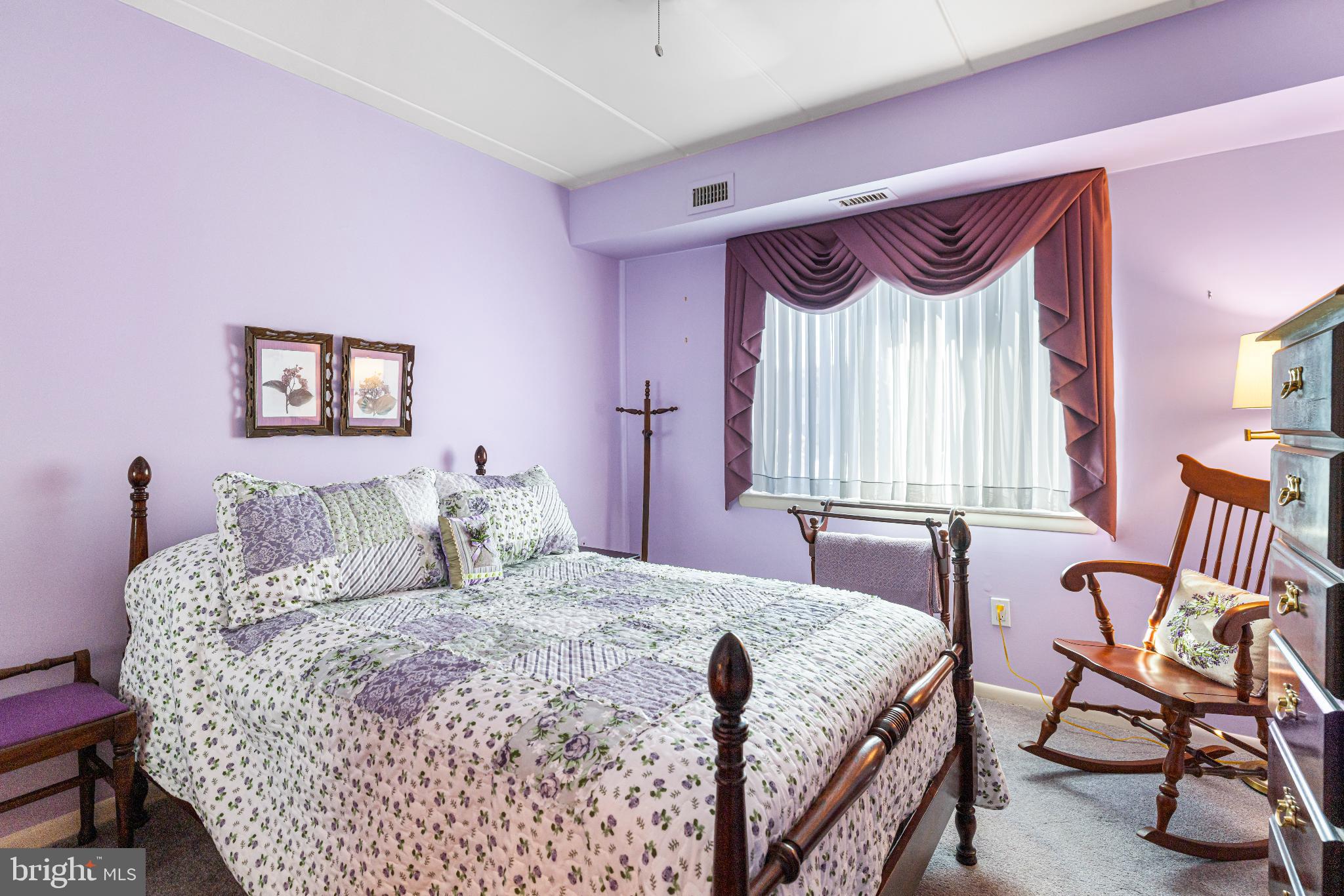 64003 Delaire Landing Road, Unit 3 Philadelphia, PA 19114 - Photo 14 of 16 Charming purple-hued bedroom retreat.