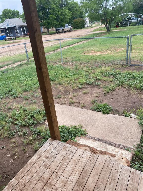 352 Southwest Ave A Hamlin, TX 79520 - Photo 13 of 13 a view of a garden with a tree