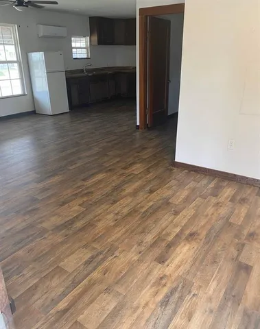 a view of livingroom with furniture and window