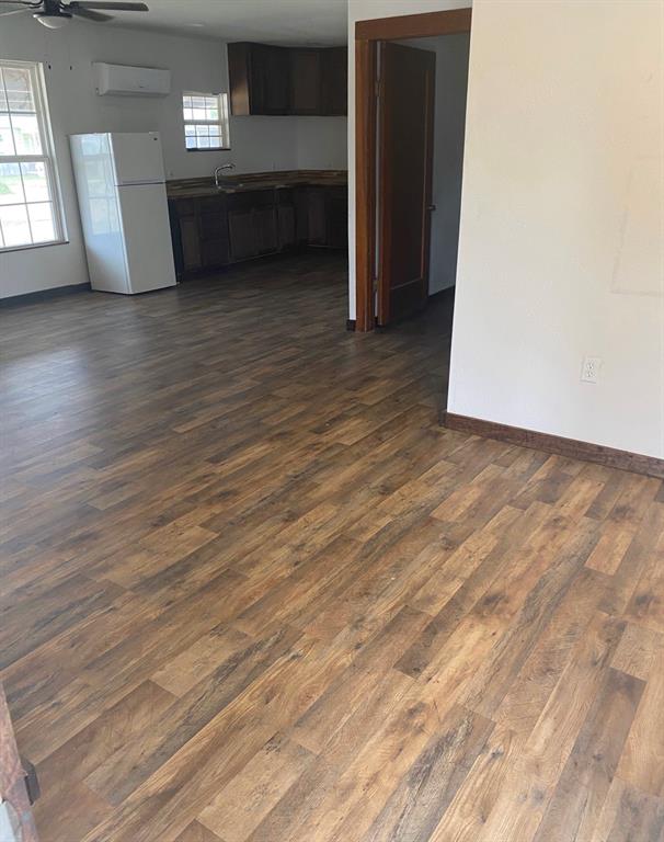 352 Southwest Ave A Hamlin, TX 79520 - Photo 4 of 13 a view of livingroom with furniture and window