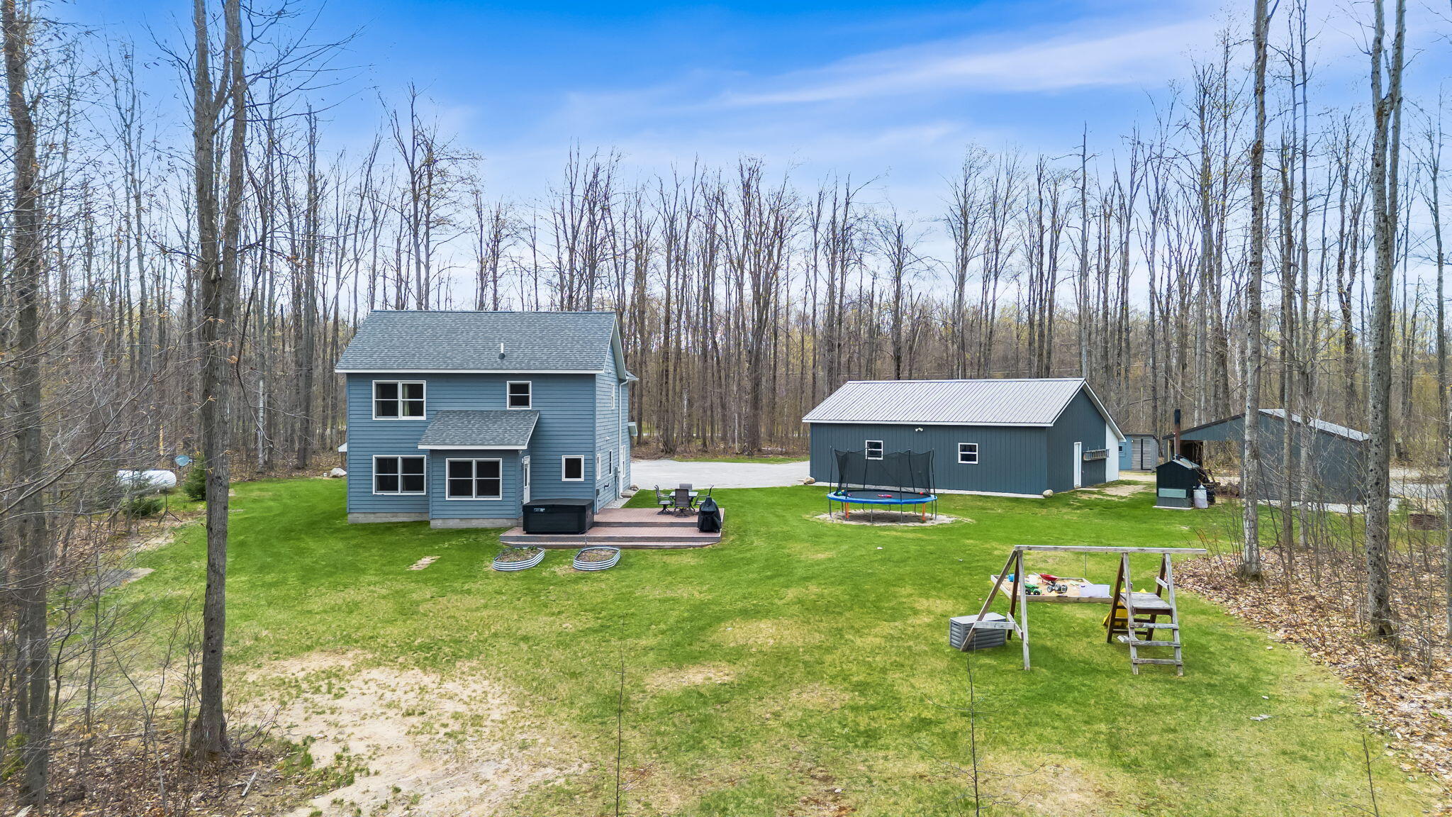 9208 Mt Frederick Road Gaylord, MI 49735 - Photo 25 of 32 Back yard