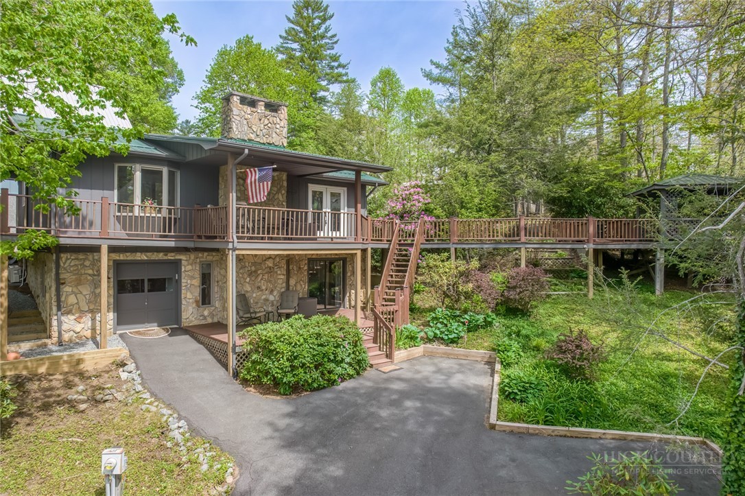 174 Spruce Pine Road Newland, NC 28657 - Photo 47 of 50 front view of a house with a yard