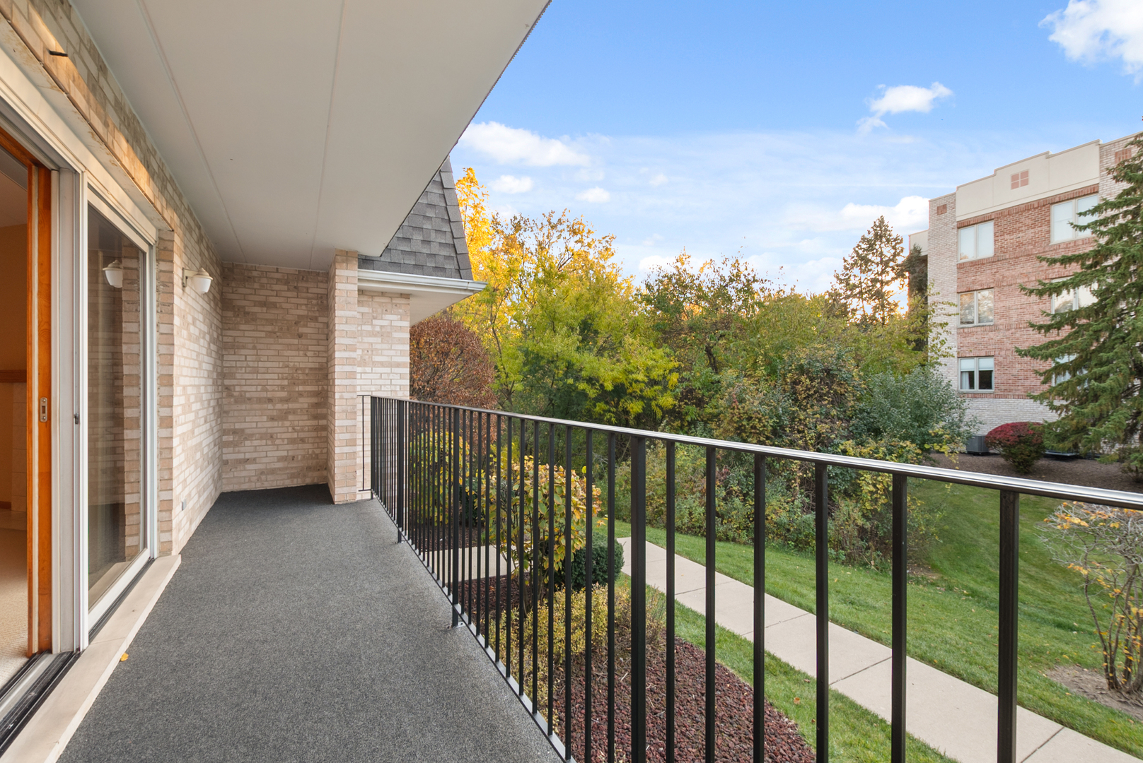 7811 West 157th Street, Unit 1N Orland Park, IL 60462 - Photo 3 of 18 a view of a balcony with an outdoor space