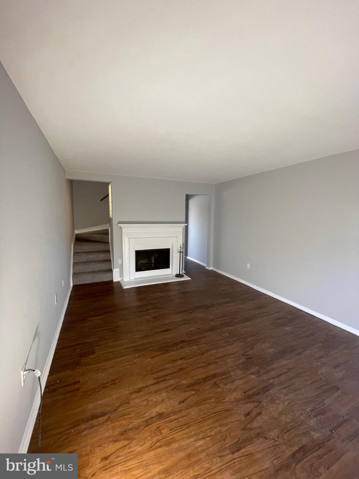 2824 Chablis Circle, Unit 7 Woodbridge, VA 22192 - Photo 5 of 11 Spacious living area with elegant fireplace.