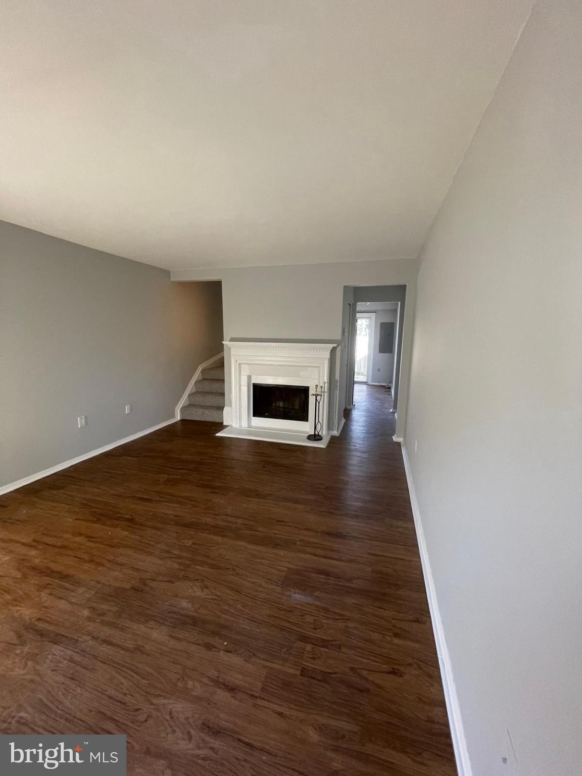 2824 Chablis Circle, Unit 7 Woodbridge, VA 22192 - Photo 6 of 11 Spacious living area with elegant fireplace.