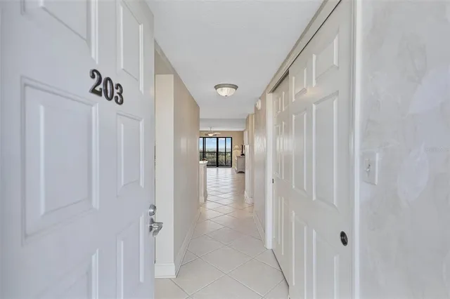 a view of a dining room with furniture and window