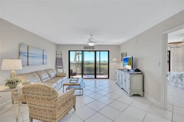 a kitchen that has a sink a stove and cabinets